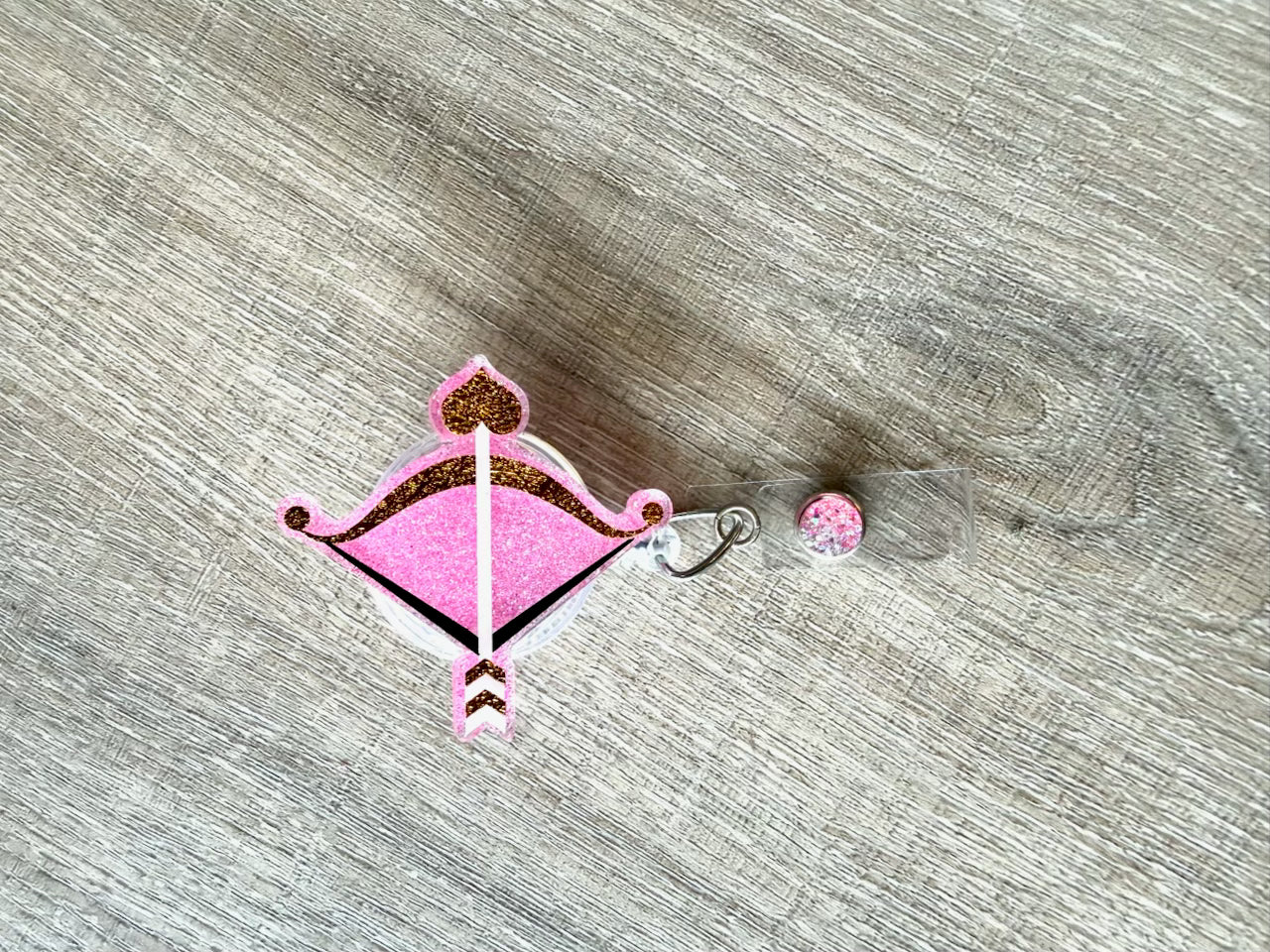 Cupid’s Arrow (Pink) Badge Reel