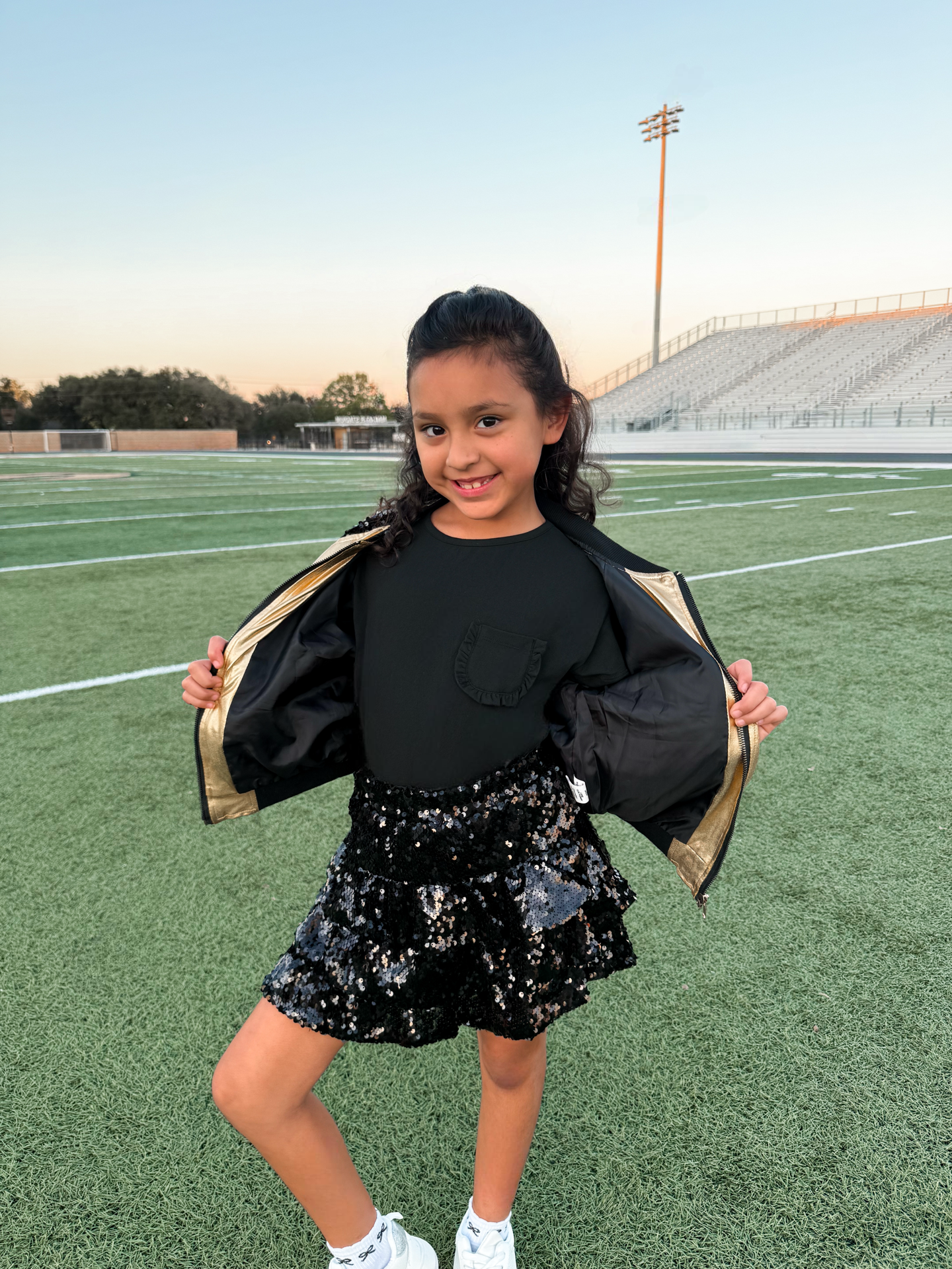 The Playtime Black Ruffle Pocket Tee