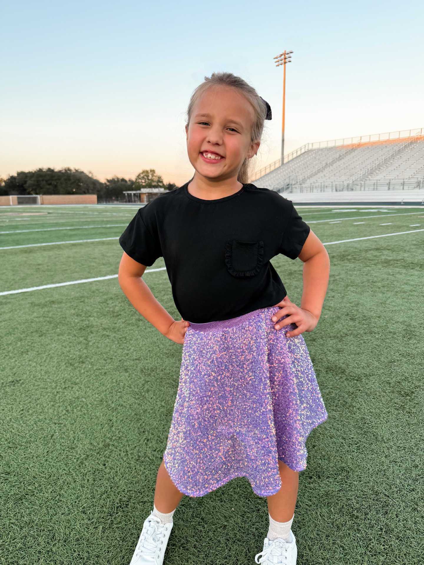 The Playtime Black Ruffle Pocket Tee