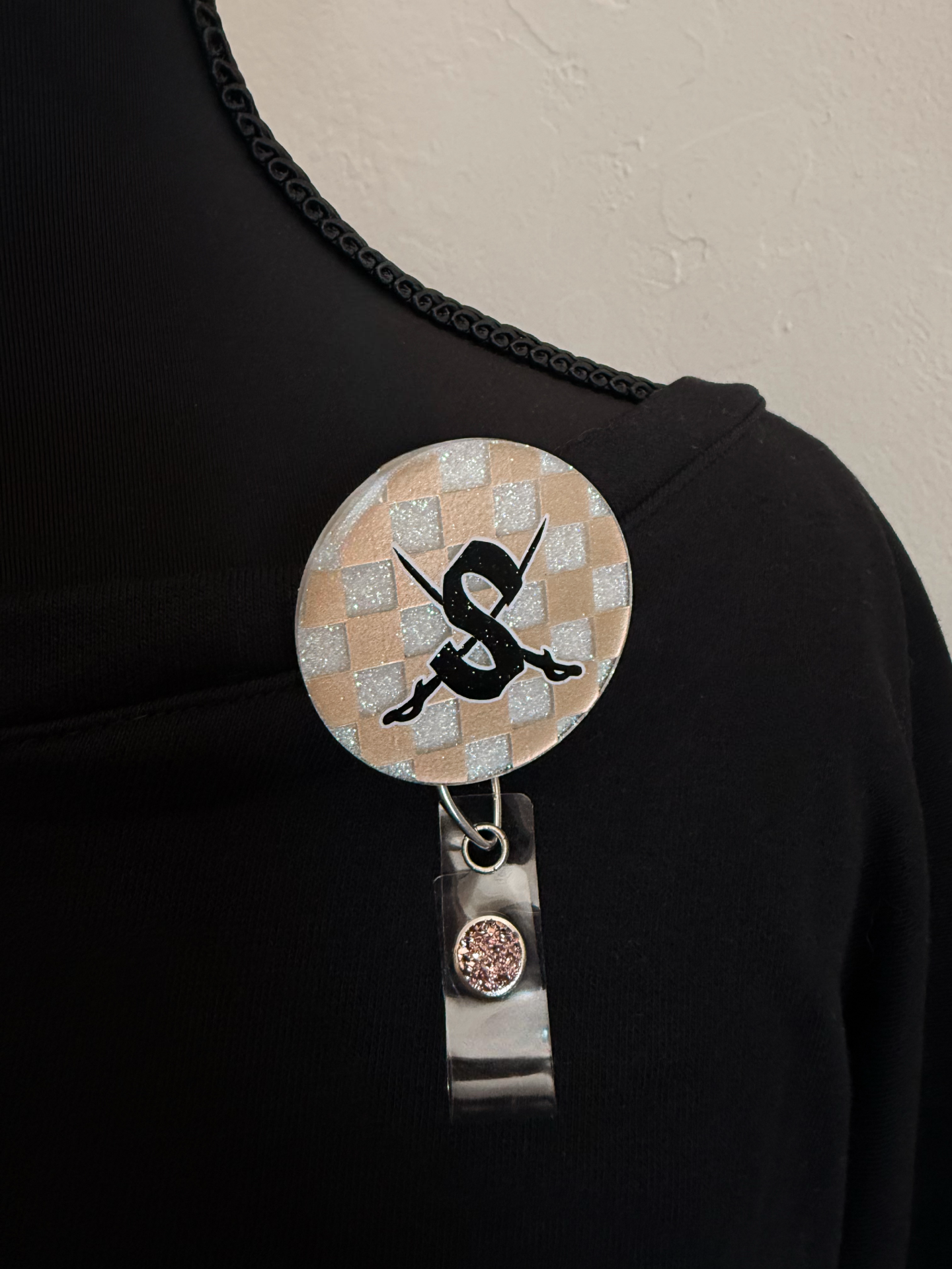 Checkered Swords Up Badge Reel