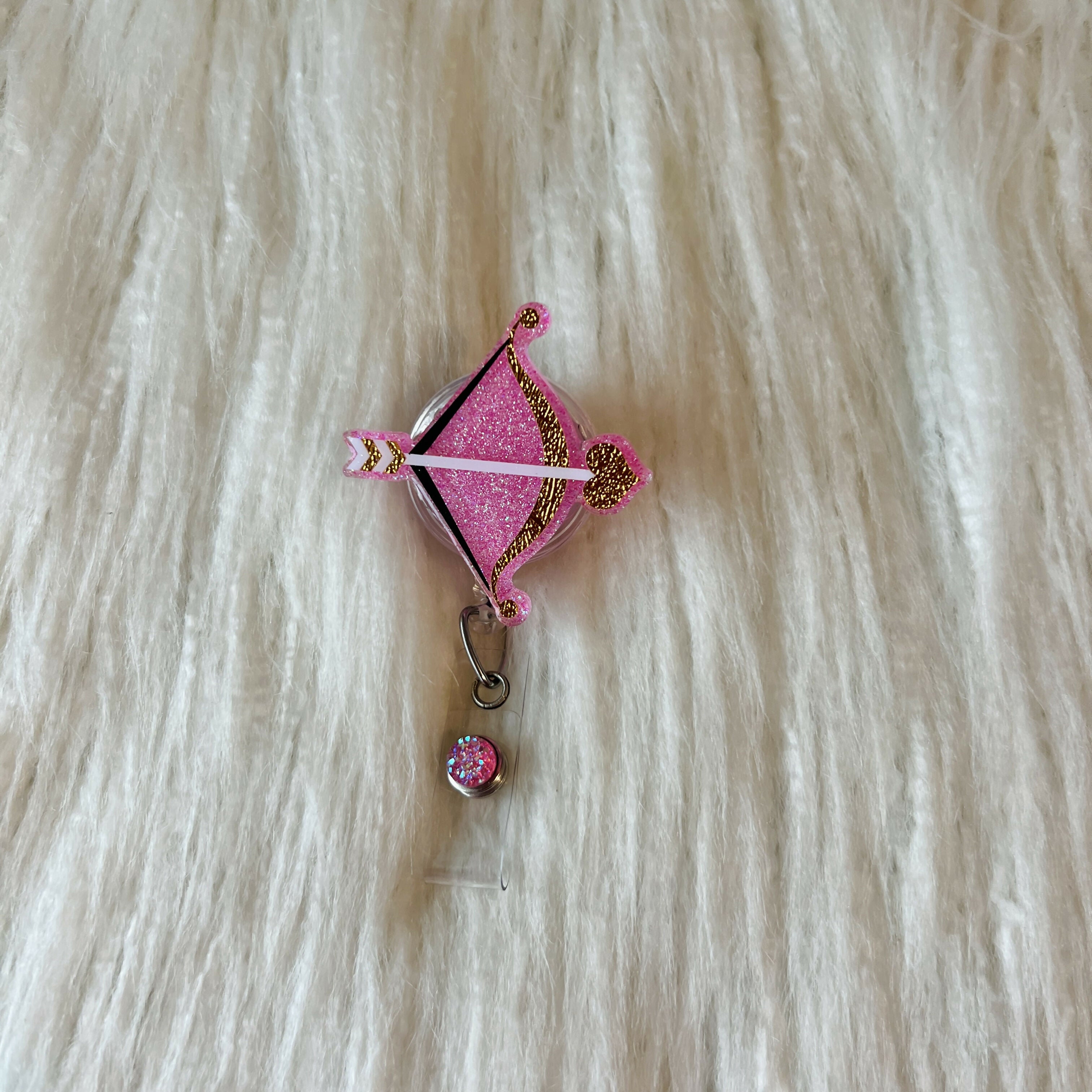 Cupid’s Arrow (Pink) Badge Reel